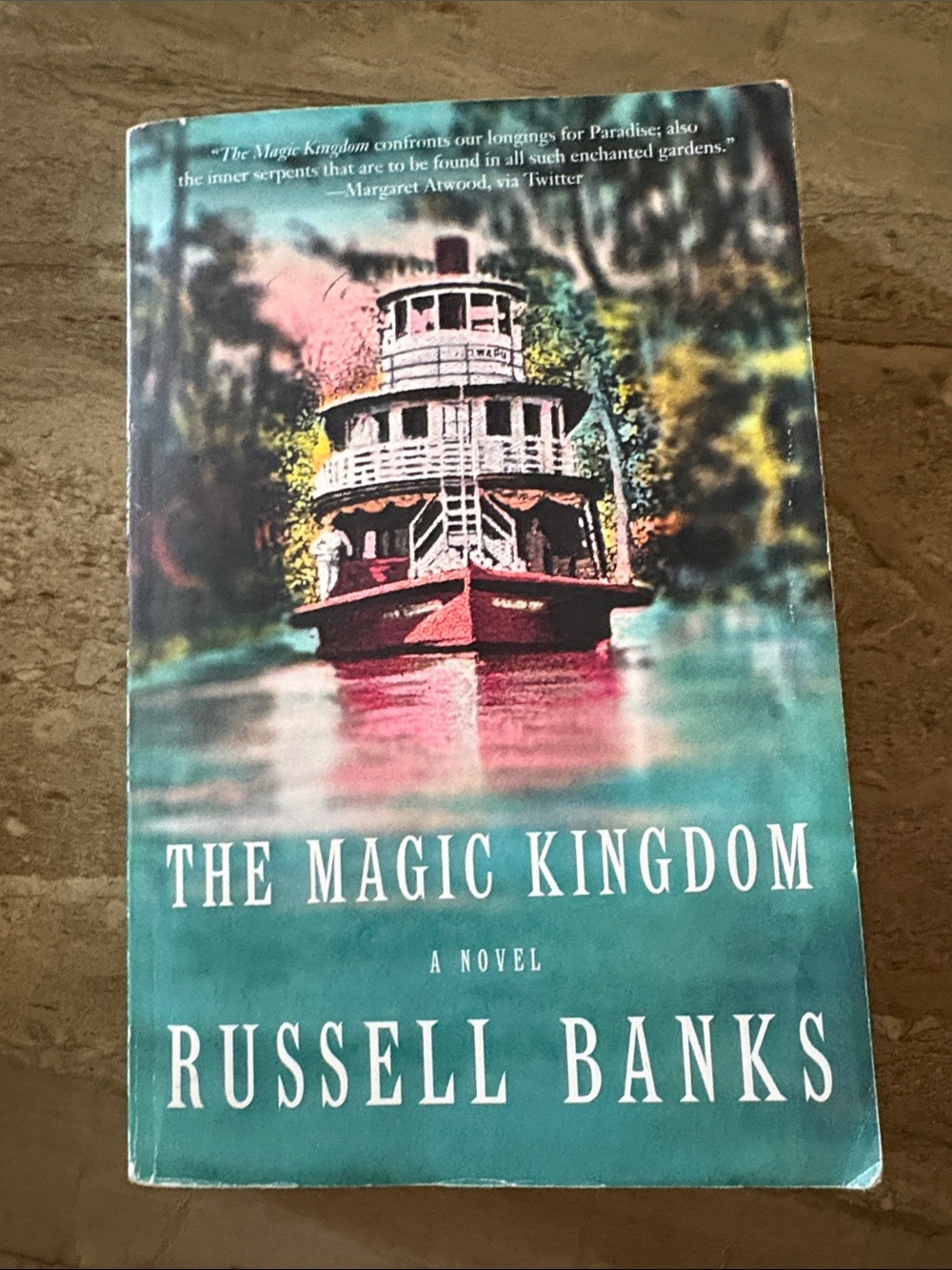 The Magic Kingdom by Russell Banks — Teal Book Cover